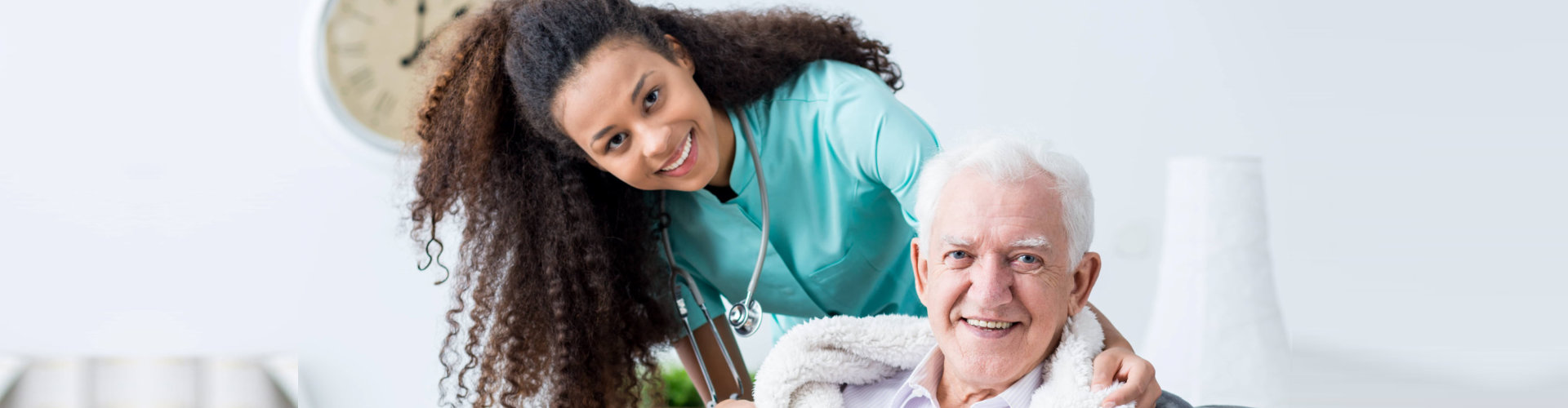 image of a female caregiver with an elderly man